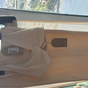 MESHKI super cute top and skirt bought paid duties and taxes was way to big